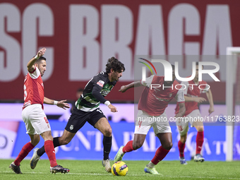 Joao Moutinho and Sikou Niakate of SC Braga compete for the ball with Francisco Trincao of Sporting CP during the Liga Portugal Betclic matc...