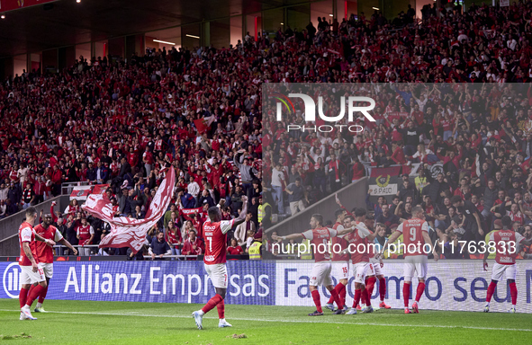 Ricardo Horta of SC Braga celebrates with his teammates after scoring his team's first goal during the Liga Portugal Betclic match between S...