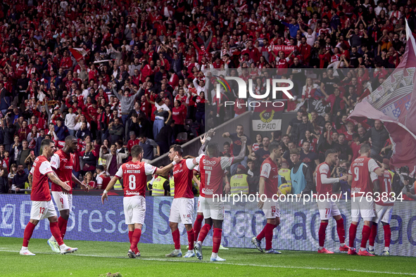 Ricardo Horta of SC Braga celebrates with his teammates after scoring his team's first goal during the Liga Portugal Betclic match between S...