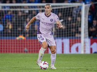 Oriol Romeu of Girona FC is in action with the ball during the La Liga EA Sports 2024/25 football match between Getafe CF and Girona FC at E...