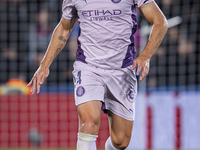 Oriol Romeu of Girona FC is in action with the ball during the La Liga EA Sports 2024/25 football match between Getafe CF and Girona FC at E...