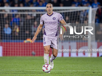 Oriol Romeu of Girona FC is in action with the ball during the La Liga EA Sports 2024/25 football match between Getafe CF and Girona FC at E...