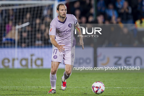 Daley Blind of Girona FC is in action with the ball during the La Liga EA Sports 2024/25 football match between Getafe CF and Girona FC at E...