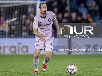 Daley Blind of Girona FC is in action with the ball during the La Liga EA Sports 2024/25 football match between Getafe CF and Girona FC at E...