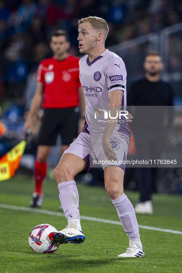 Donny van de Beek of Girona FC is in action with the ball during the La Liga EA Sports 2024/25 football match between Getafe CF and Girona F...