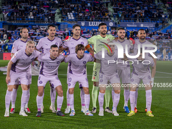 Players of Girona FC pose for the official photo during the La Liga EA Sports 2024/25 football match between Getafe CF and Girona FC at Esta...