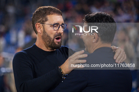 Jose Bordalas, head coach of Getafe CF, cheers Miguel Angel Sanchez (Michel), head coach of Girona FC, during the La Liga EA Sports 2024/25...