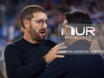 Jose Bordalas, head coach of Getafe CF, cheers Miguel Angel Sanchez (Michel), head coach of Girona FC, during the La Liga EA Sports 2024/25...