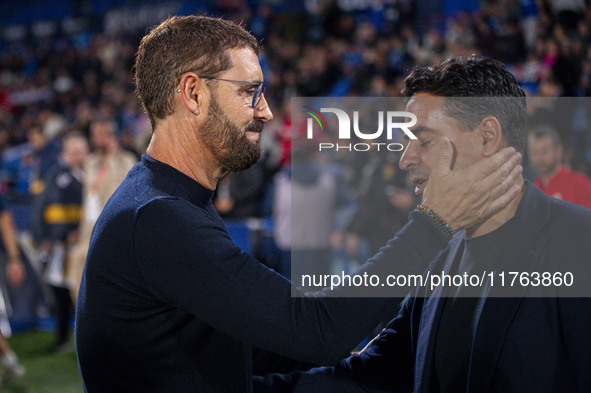 Jose Bordalas, head coach of Getafe CF, cheers Miguel Angel Sanchez (Michel), head coach of Girona FC, during the La Liga EA Sports 2024/25...