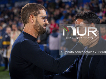 Jose Bordalas, head coach of Getafe CF, cheers Miguel Angel Sanchez (Michel), head coach of Girona FC, during the La Liga EA Sports 2024/25...