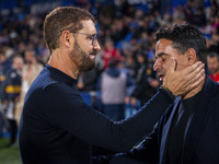 Jose Bordalas, head coach of Getafe CF, cheers Miguel Angel Sanchez (Michel), head coach of Girona FC, during the La Liga EA Sports 2024/25...