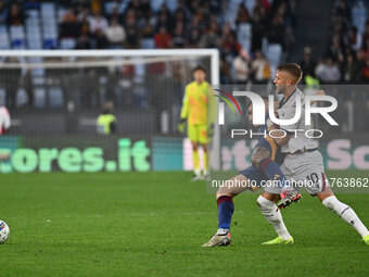 Gianluca Mancini of A.S. Roma and Jesper Karlsson of Bologna F.C. are in action during the 12th day of the Serie A Championship between A.S....