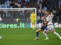 Gianluca Mancini of A.S. Roma and Jesper Karlsson of Bologna F.C. are in action during the 12th day of the Serie A Championship between A.S....