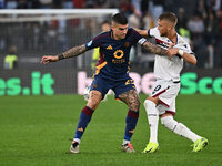 Gianluca Mancini of A.S. Roma and Jesper Karlsson of Bologna F.C. are in action during the 12th day of the Serie A Championship between A.S....