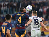 Bryan Cristante of A.S. Roma and Tommaso Pobega of Bologna F.C. are in action during the 12th day of the Serie A Championship between A.S. R...