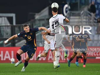 Artem Dovbyk of A.S. Roma and Nicolo Casale of Bologna F.C. are in action during the 12th day of the Serie A Championship between A.S. Roma...