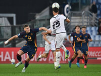 Artem Dovbyk of A.S. Roma and Nicolo Casale of Bologna F.C. are in action during the 12th day of the Serie A Championship between A.S. Roma...