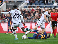 Jhon Lucumi of Bologna F.C., Stephan El Shaarawy of A.S. Roma, and Stefan Posch of Bologna F.C. are in action during the 12th day of the Ser...