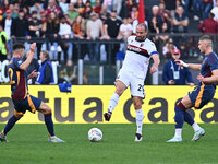 Stephan El Shaarawy of A.S. Roma, Lorenzo De Silvestri of Bologna F.C., and Artem Dovbyk of A.S. Roma are in action during the 12th day of t...