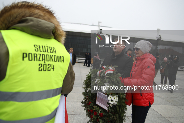 In Warsaw, Poland, on November 10, 2024, Zbigniew Komosa and his wife want to lay their wreath during the monthly celebrations of the Smolen...