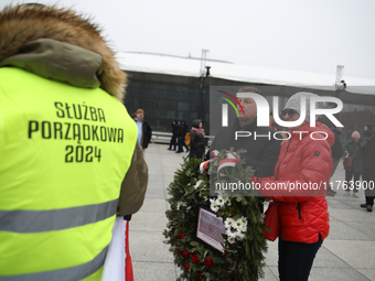 In Warsaw, Poland, on November 10, 2024, Zbigniew Komosa and his wife want to lay their wreath during the monthly celebrations of the Smolen...