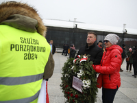 In Warsaw, Poland, on November 10, 2024, Zbigniew Komosa and his wife want to lay their wreath during the monthly celebrations of the Smolen...