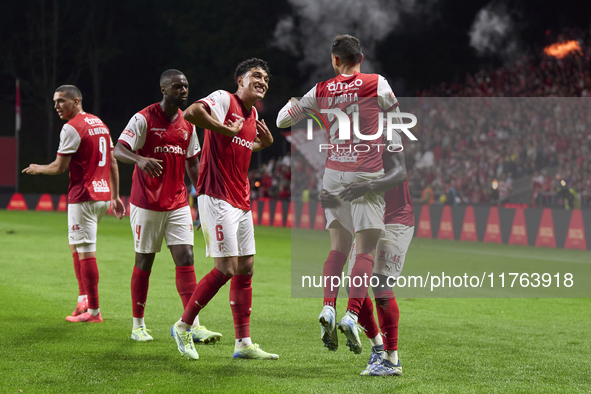 Ricardo Horta of SC Braga celebrates with his teammates after scoring his team's second goal during the Liga Portugal Betclic match between...