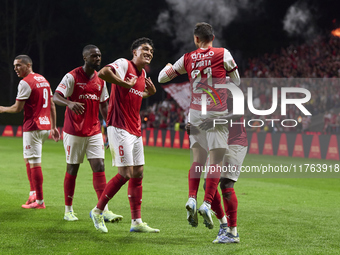 Ricardo Horta of SC Braga celebrates with his teammates after scoring his team's second goal during the Liga Portugal Betclic match between...