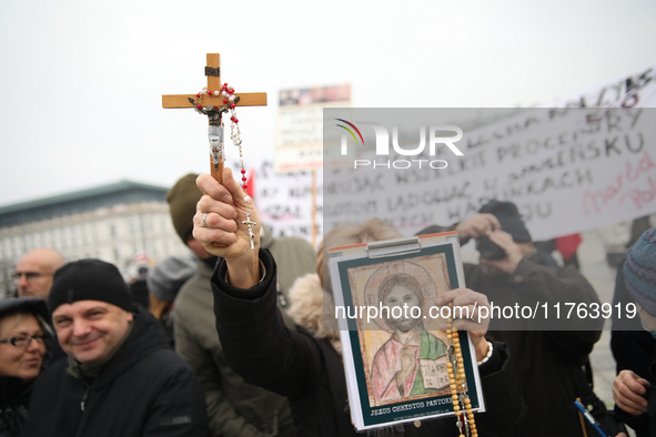 In Warsaw, Poland, on November 10, 2024, people supporting the PiS party participate in the monthly celebrations of the Smolensk disaster at...