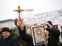 In Warsaw, Poland, on November 10, 2024, people supporting the PiS party participate in the monthly celebrations of the Smolensk disaster at...