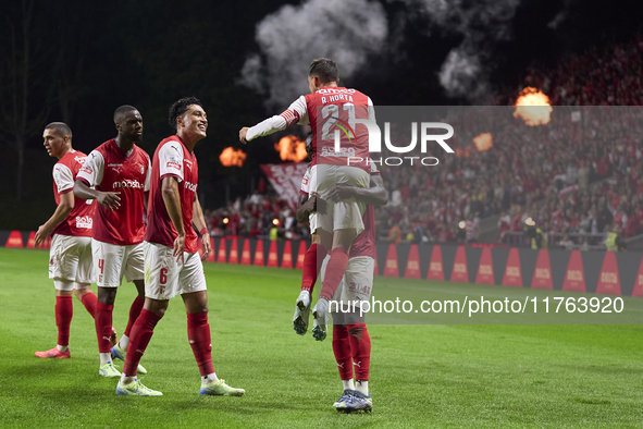 Ricardo Horta of SC Braga celebrates with his teammates after scoring his team's second goal during the Liga Portugal Betclic match between...