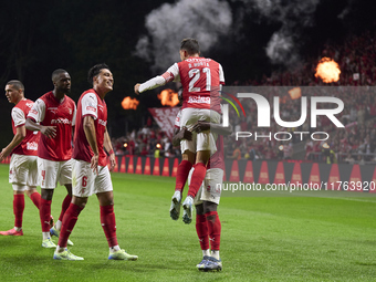 Ricardo Horta of SC Braga celebrates with his teammates after scoring his team's second goal during the Liga Portugal Betclic match between...