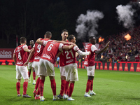 Ricardo Horta of SC Braga celebrates with his teammates after scoring his team's second goal during the Liga Portugal Betclic match between...