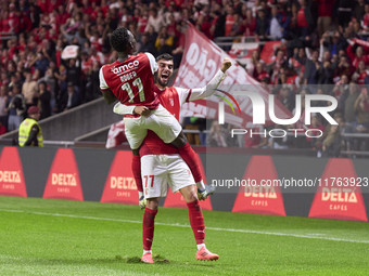 Gabri Martinez (R) and Roger Fernandes of SC Braga celebrate after Ricardo Horta (not in frame) scores their side's second goal during the L...