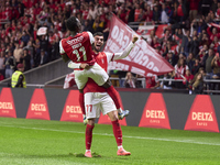 Gabri Martinez (R) and Roger Fernandes of SC Braga celebrate after Ricardo Horta (not in frame) scores their side's second goal during the L...