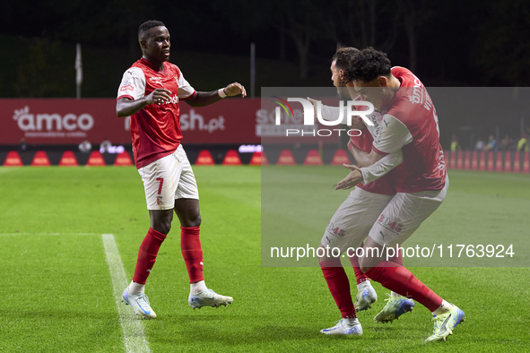 Ricardo Horta of SC Braga celebrates with his teammates after scoring his team's second goal during the Liga Portugal Betclic match between...