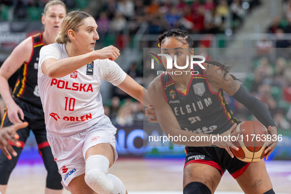 Anna Makurat and Maxuela Lisowa in action during the FIBA 2025 European Women's Basketball Championship Qualifiers Group C match between Pol...