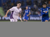 Miguel Gutierrez of Girona is in action during the La Liga 2024/25 match between Getafe and Girona at Coliseum Stadium in Madrid, Spain, on...