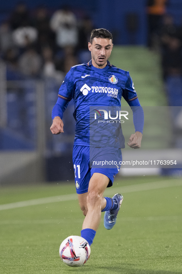 Juan Iglesias of Getafe is in action during the La Liga 2024/25 match between Getafe and Girona at Coliseum Stadium in Madrid, Spain, on Nov...