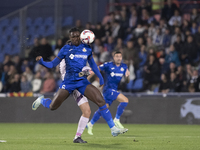 In Madrid, Spain, on November 10, Christantus Uche of Getafe and Arnau Martinez of Girona fight for the ball during the La Liga 2024/25 matc...