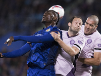 In Madrid, Spain, on November 10, Christantus Uche of Getafe and Daley Blind of Girona fight for the ball during the La Liga 2024/25 match b...