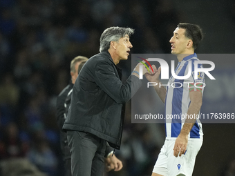 Imanol Alguacil head coach of Real Sociedad gives instructions  to Mikel Oyarzabal centre-forward of Real Sociedad and Spain during the LaLi...