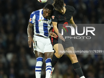 Pau Cubarsi centre-back of Barcelona and Spain and Sheraldo Becker centre-forward of Real Sociedad and Netherlands compete for the ball duri...