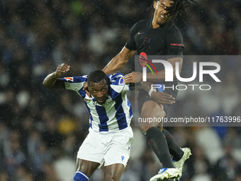 Jules Kounde centre-back of Barcelona and France and Sheraldo Becker centre-forward of Real Sociedad and Netherlands compete for the ball du...