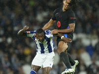 Jules Kounde centre-back of Barcelona and France and Sheraldo Becker centre-forward of Real Sociedad and Netherlands compete for the ball du...