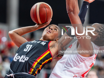 Maxuela Lisowa and Stephanie Mavunga in action during the FIBA 2025 European Women's Basketball Championship Qualifiers Group C match betwee...