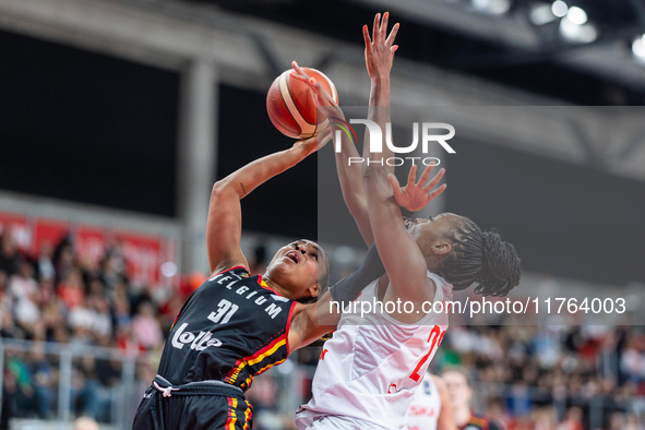 Maxuela Lisowa and Stephanie Mavunga in action during the FIBA 2025 European Women's Basketball Championship Qualifiers Group C match betwee...