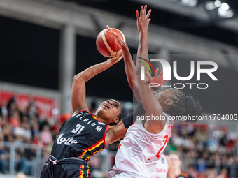 Maxuela Lisowa and Stephanie Mavunga in action during the FIBA 2025 European Women's Basketball Championship Qualifiers Group C match betwee...