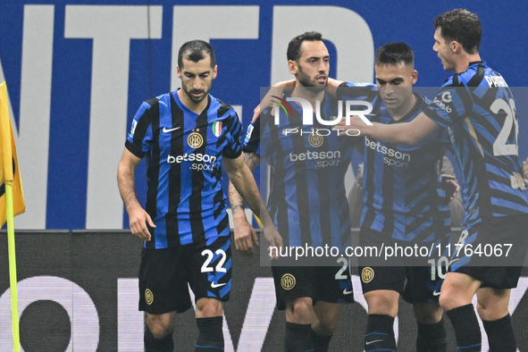 Hakan Calhanoglu of Inter FC celebrates after a goal during the Italian Serie A football match between Inter FC and SSC Napoli at Giuseppe M...