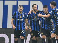 Hakan Calhanoglu of Inter FC celebrates after a goal during the Italian Serie A football match between Inter FC and SSC Napoli at Giuseppe M...